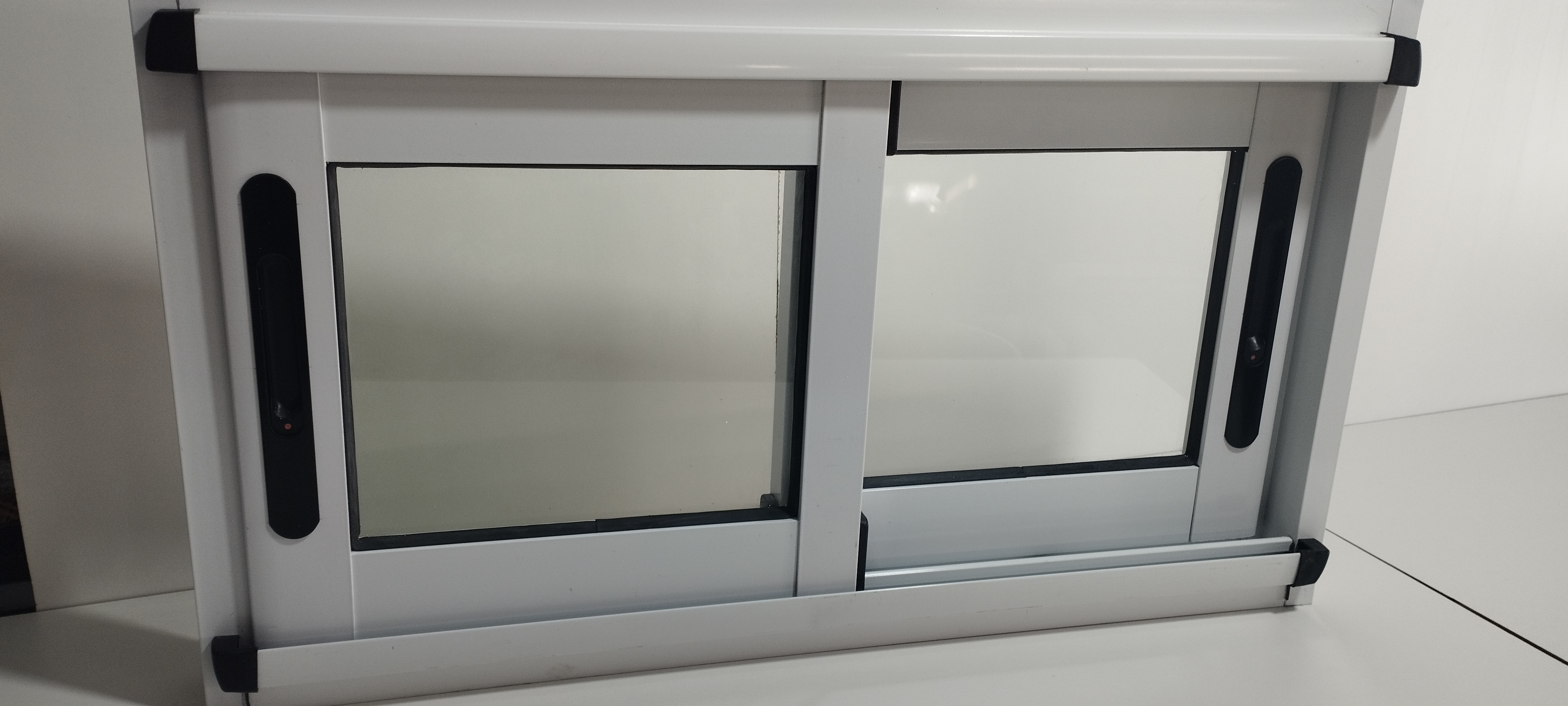 Línea Patagonia Módena FEXA SRL — ventanas y puertas de aluminio